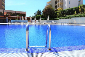 Отель OÁSIS Beach Apartment  Портиман